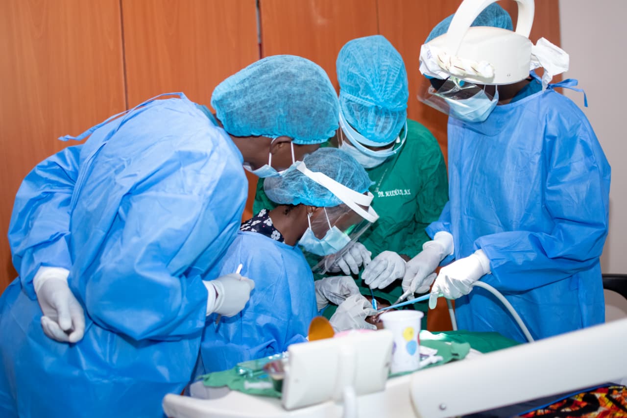 A close-up of state-of-the-art dental equipment and a comfortable chair.