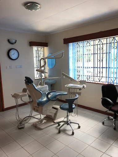 Clean and well-equipped dental treatment room.